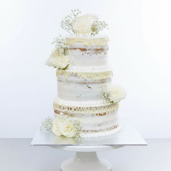 Three Tier Semi Naked Drip Cake